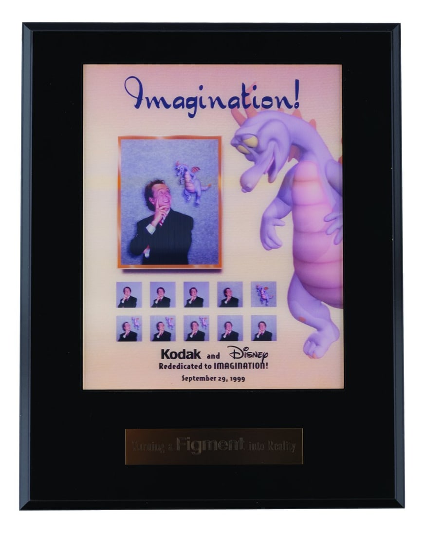A Journey into YOUR Imagination Lenticular Plaque.: (Epcot, 1999) A lenticular Journey into YOUR Imagination plaque given to the attraction’s project team to commemorate its Grand Opening. This updated version of the attraction features Figment and