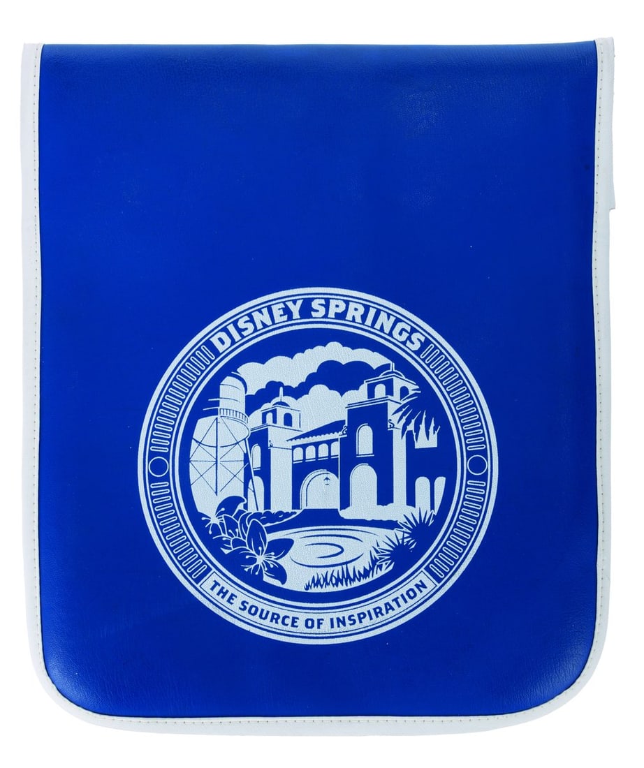 A Disney Springs Crowd Control Flag.: (Walt Disney World Resort, 2015-2020s) A crowd control flag from the Walt Disney World Resort shopping, restaurant, and entertainment district, Disney Springs. Measuring 12" x 14", the flag is in