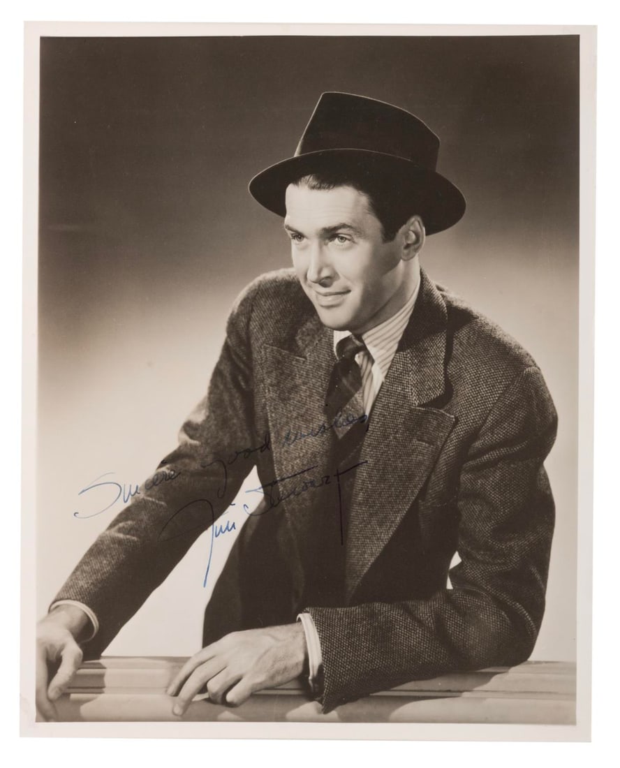 A Signed Jimmy Stewart Photo.: (Stewart, 1940s-50s) A signed photo of Jimmy Stewart. Measuring 8" x 10", the photo is in very good condition with minimal soiling and discoloration.