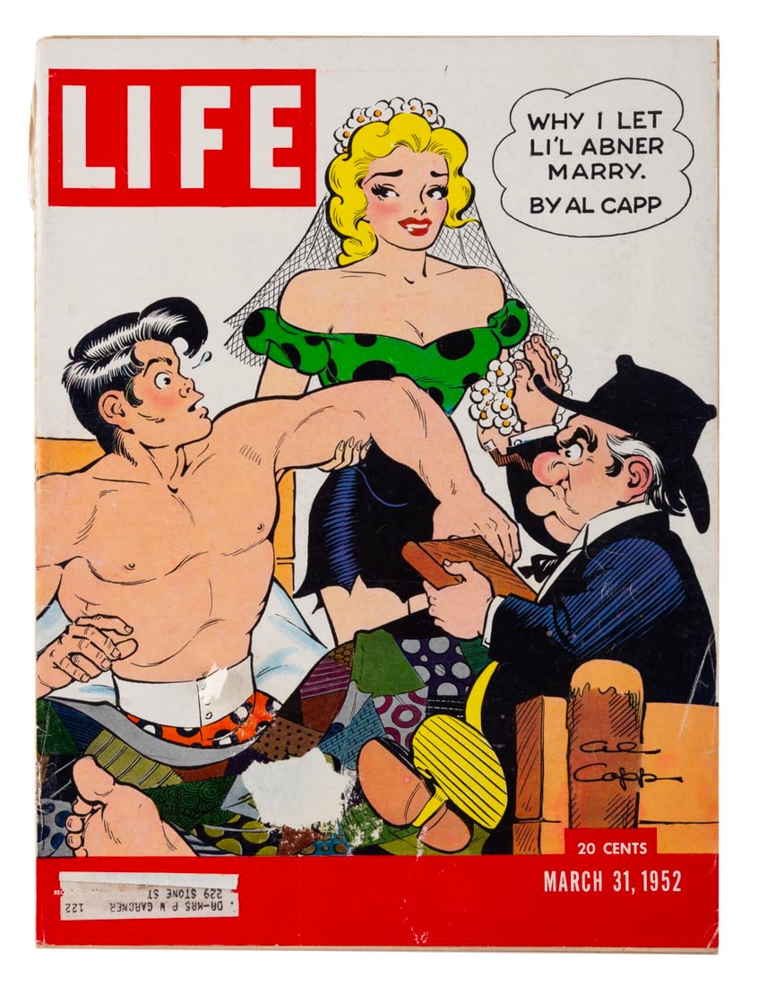 A Jane Russell signed 1952 LIFE Magazine.: (LIFE, 1952) A March 31, 1952 issue of LIFE magazine, with a full page ad for the film "Macao" signed by actress Jane Russell. The cover displays the long-awaited wedding of Li'l Abner and Daisy Mae. 