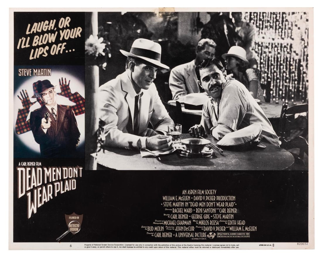A “Dead Men Don't Wear Plaid?? Lobby Card.: (Universal, 1982) An original lobby card for Carl Reiner’s neo-noir comedy “Dead Mean Don’t Wear Plaid” starring Steve Martin. Measuring 11" x 14" the card is in good condition with