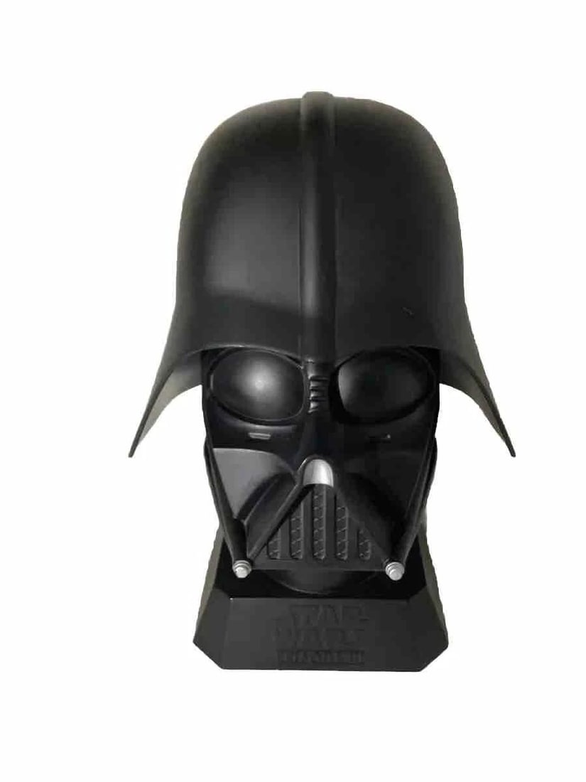 A Kellogg’s Plastic Darth Vader Cookie Jar.: (Kellogg’s, 2005) A plastic cookie jar in the shape of Darth Vader’s head, originally offered during the promotion of “Revenge of the Sith.” Measuring 9” x 8” x 10”