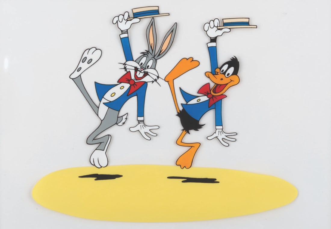 A Bugs Bunny and Daffy Duck Sericel.: (Warner Bros., 1980s-90s) A sericel of Bugs Bunny and Daffy Duck dancing in a spotlight. With an image size of 6.25” x 8” on the 11” x 14” cel, the piece displays in fine
