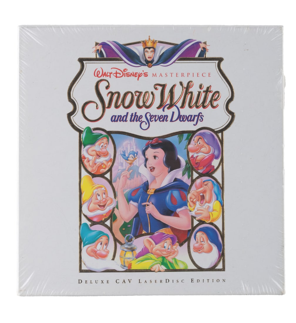 A "Snow White and the Seven Dwarfs" Deluxe Edition LaserDisc.: (Disney, 1994) A "Snow White and the Seven Dwarfs" Deluxe LaserDisc Edition box set. The set includes a 2-disc set of the feature film, a “Making of the Masterpiece” disc, a hardcover book on