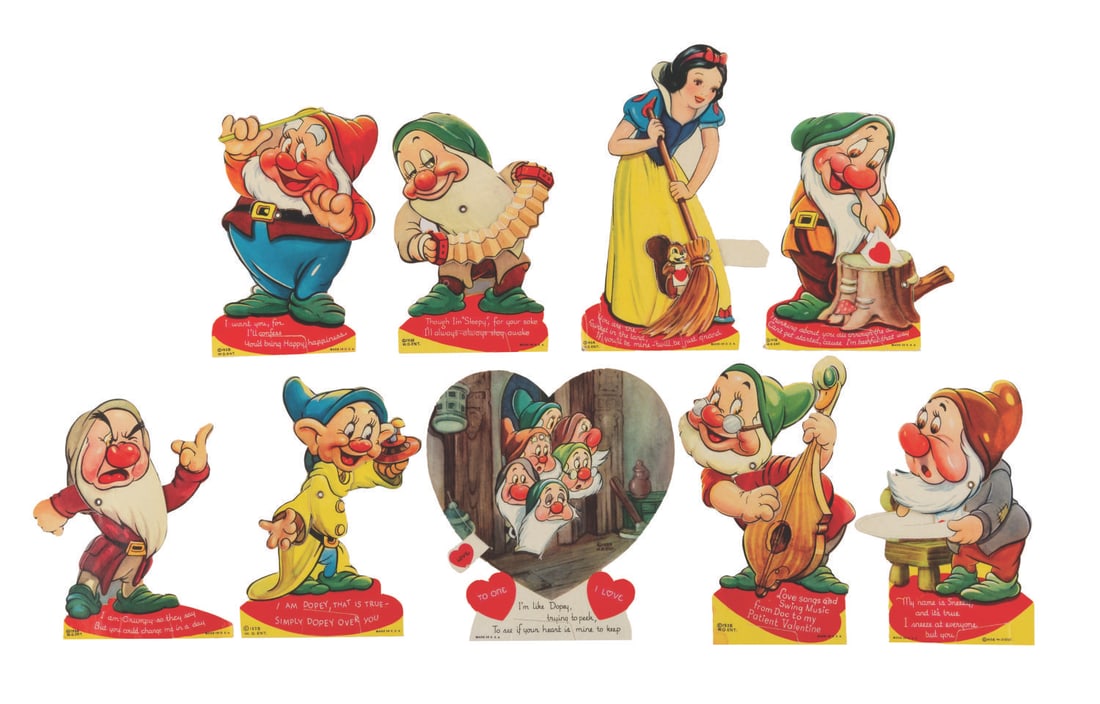 A “Snow White and the Seven Dwarfs?? Valentine's Day Card Collection.: (Disney, 1938) A collection of nine mechanical "Snow White and the Seven Dwarfs" Valentine’s Day cards, each with a movable feature. Measuring 4.5" to 5.75" long, the collection is in good