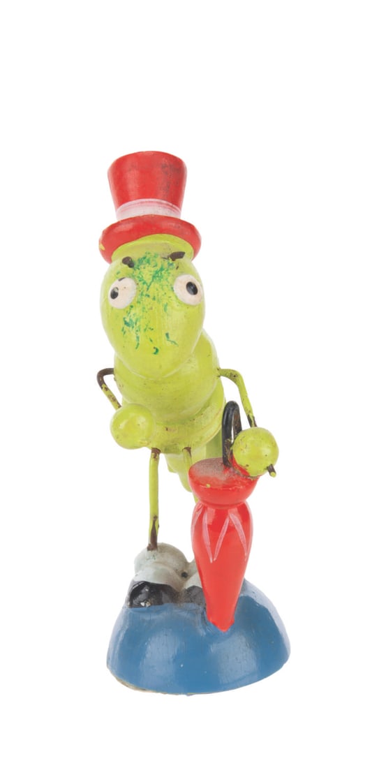 A Jiminy Cricket Hand-Painted Figure.: (Unknown, 1950s-60s) A hand-painted figure of a non-Disney Jiminy Cricket from the Pinocchio story. Standing 2.5" tall, the figure is in very good condition with very light wear from display.