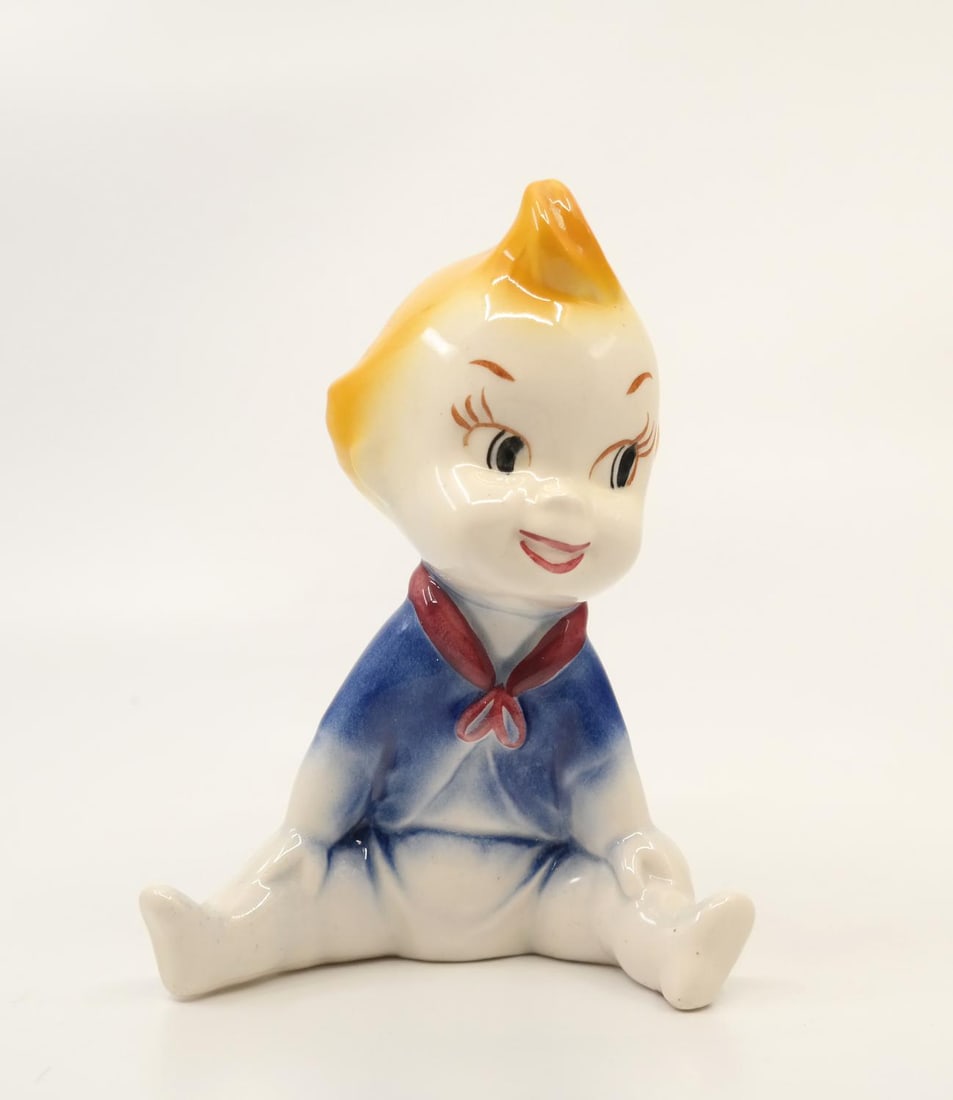A “Reluctant Dragon?? Baby Weems Ceramic Figurine.: (Vernon Kilns, 1941) An original ceramic figurine of Baby Weems from "The Reluctant Dragon." Measuring 4.5" x 3" and 6" tall, the figurine is in very good condition.