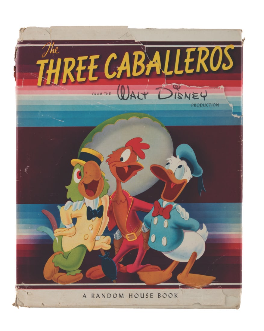 A "The Three Caballeros" Storybook.: (Random House, 1944) A storybook based on Walt Disney's 1944 animated feature "The Three Caballeros." Measuring 9" x 11.25", the book is in good condition with heavy wear to the dust jacket,