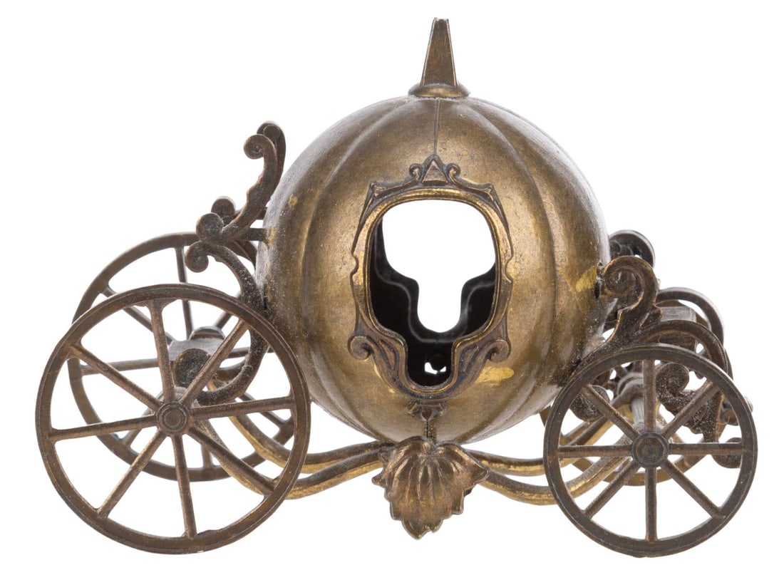 A Cinderella Pumpkin Carriage Trinket Box.: (1950s-70s) A metal Cinderella pumpkin carriage miniature. Measuring 3.25" x 1.5" x 2.5" high, the miniature is in very good condition with light wear.
