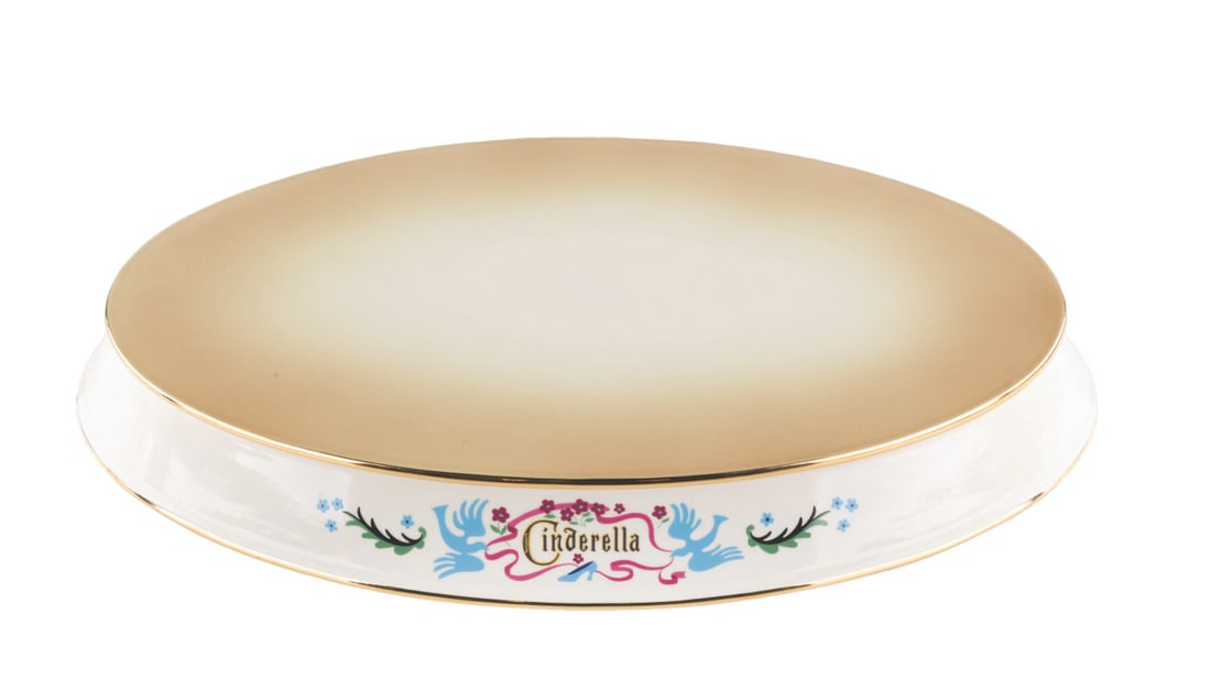 A WDCC "Cinderella Base.: (WDCC, 2004) A Walt Disney Classics Collection “Cinderella Base” to display the Prince Charming and Cinderella figurine "So This is Love." Measuring 8.25" x 11.75" x 1.5" tall, the ceramic bas