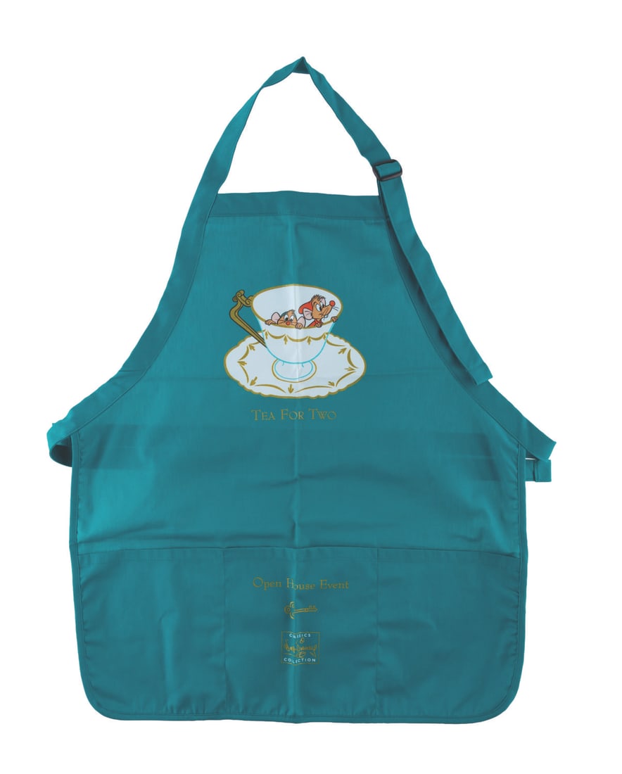 A WDCC Open House "Tea For Two" Event Apron.: (WDCC, 1999) A Walt Disney Classics Collection "Tea for Two" apron worn by Cast Members at the Fall 1999 Open House event, featuring Gus and Jaq of "Cinderella" in a teacup. Measuring 21" x 28", the a