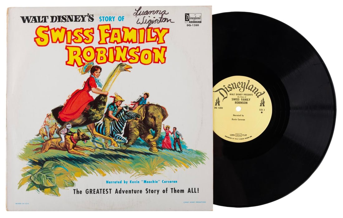 A "Swiss Family Robinson" Storybook Album.: (Disney, 1960s) A Disneyland Records storybook album for Walt Disney's "Swiss Family Robinson" narrated by Kevin Corcoran. The album is in very good condition, with handling wear, edge wear, scuffs, a
