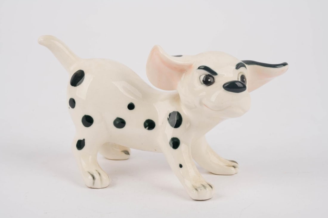 A “One Hundred and One Dalmatians?? Patch Figurine.: (Enesco, 1960s-70s) A ceramic figurine of the puppy Patch from “One Hundred and One Dalmatians.” Measuring 6” x 1.75” and 3.25” tall, the figurine is in very good condition w