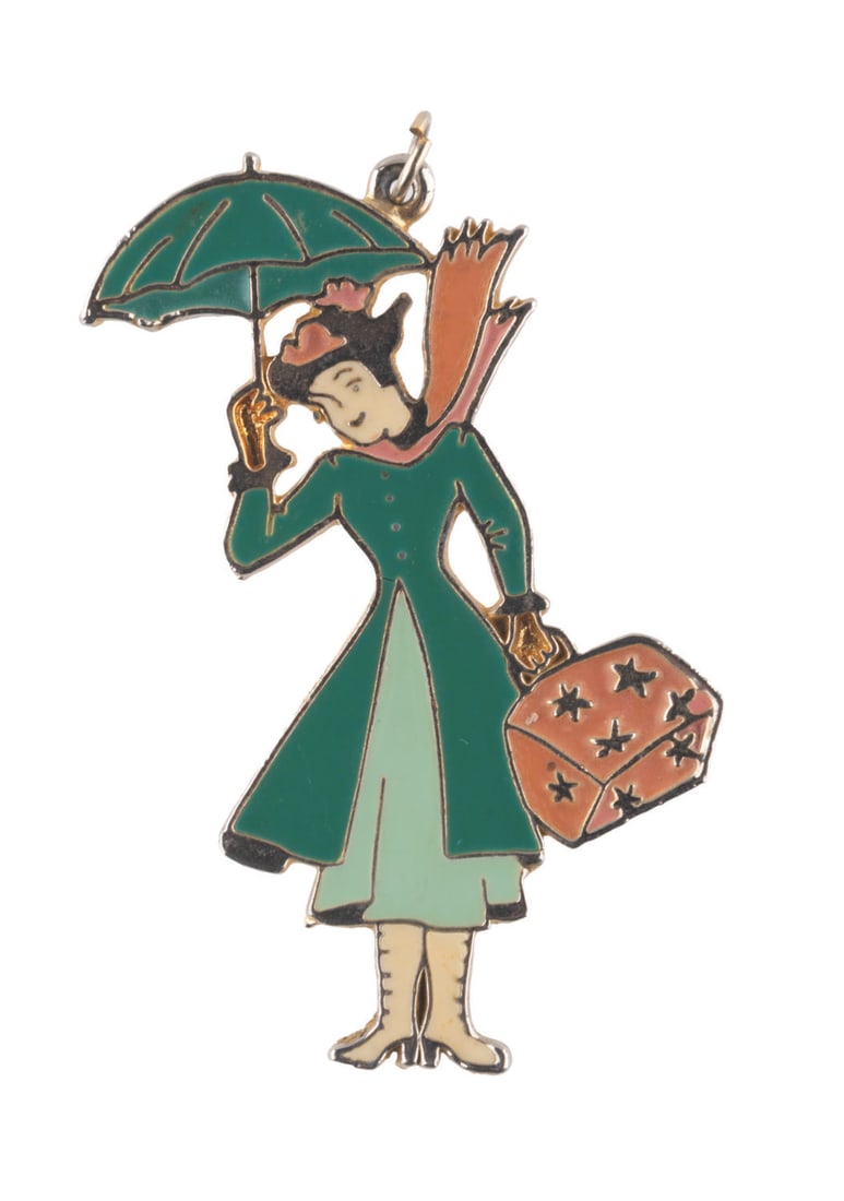 A Large "Mary Poppins" Cloisonne Pendant.: (Disney, 1960s) A large cloisonne pendant of Mary Poppins with her umbrella and carpet bag. Measuring 3” x 2”, the pendant is in good condition, with enamel missing from her hands and the 