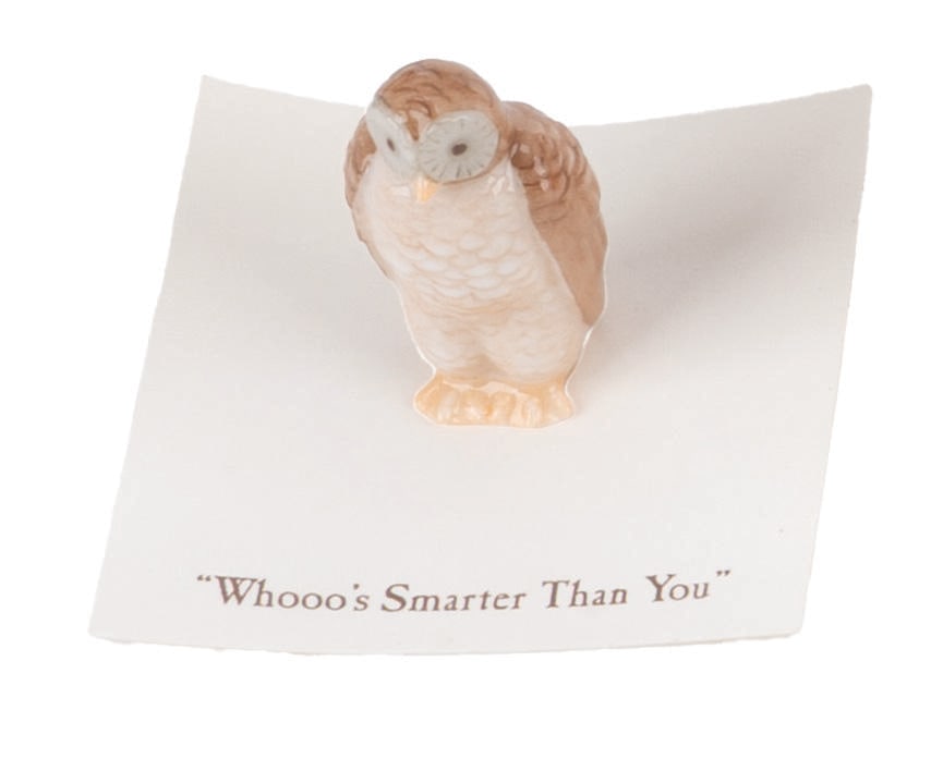 A Mini "Winnie the Pooh" Owl Figurine.: (Michel and Co., 1990s) A mini ceramic figurine of Owl, inspired by the original illustrations for the Winnie the Pooh books by E. H. Shepard. The figurine is attached to a card with a quote that