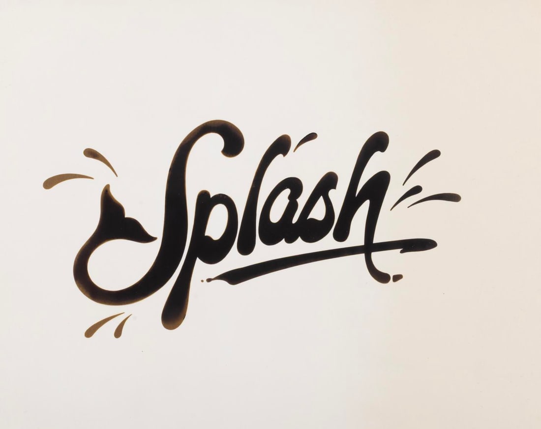 A “Splash?? DVD Title Logo.: (Touchstone, 2004) A black and white title stat for “Splash” starring Tom Hanks and Daryl Hannah. This was used on the 20th anniversary DVD released in 2004. Measuring 7.25” x 4”