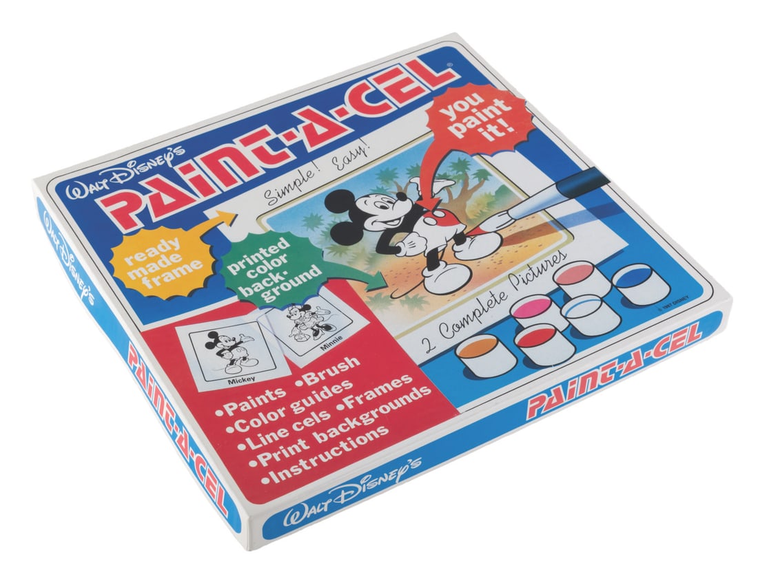 A Mickey and Minnie "Paint-A-Cel" Kit.: (Disney, 1987) A Walt Disney’s Paint-A-Cel kit for painting your own cel animation art. The kit includes two unpainted printed line-art cels featuring Mickey and Minnie, paints, a brush, instruction