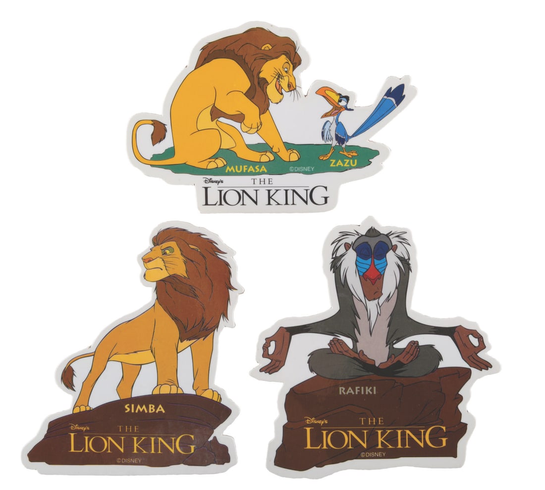 Three “The Lion King?? Pins.: (Disney, 1990s) Three large cardboard “The Lion King” pins, including one of Simba, Rafiki, and Mufasa with Zazu. Ranging in size from 3.25" x 4.25" to 4" x 4", the pins are in good to very