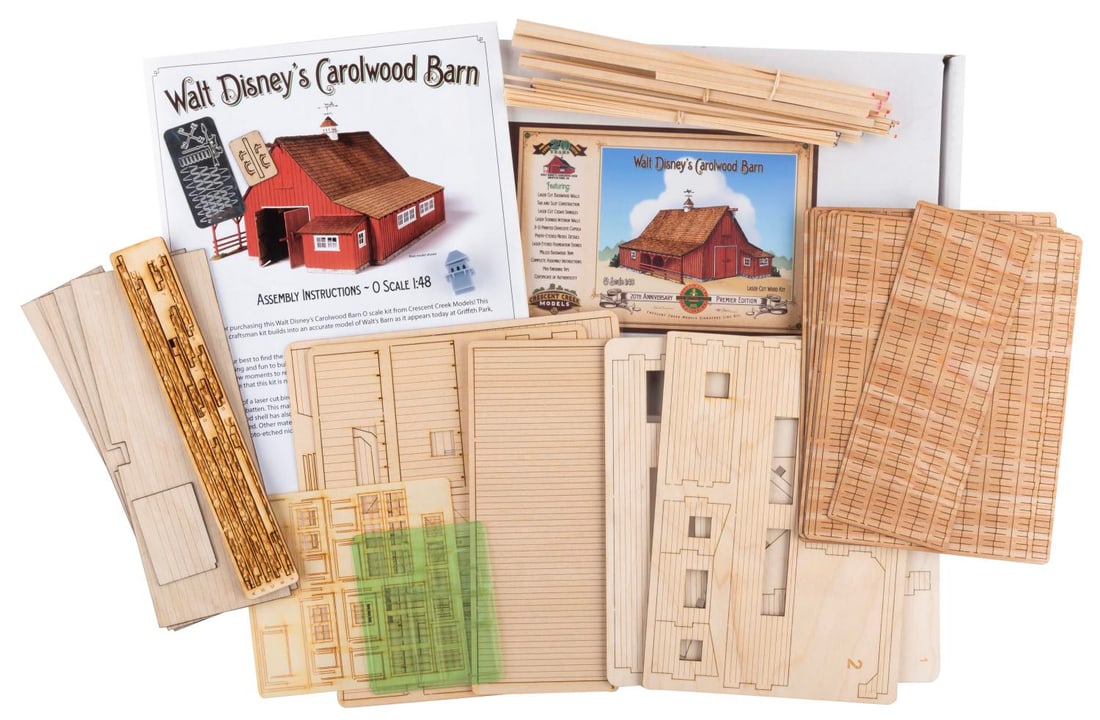 A Walt Disney's Carolwood Railroad Barn Model.: (Crescent Creek, 2019) A complete O-scale lasercut, basswood model of Walt Disney’s Carolwood Barn. The kit of Walt Disney’s backyard railroad includes all parts, an instruction book, a