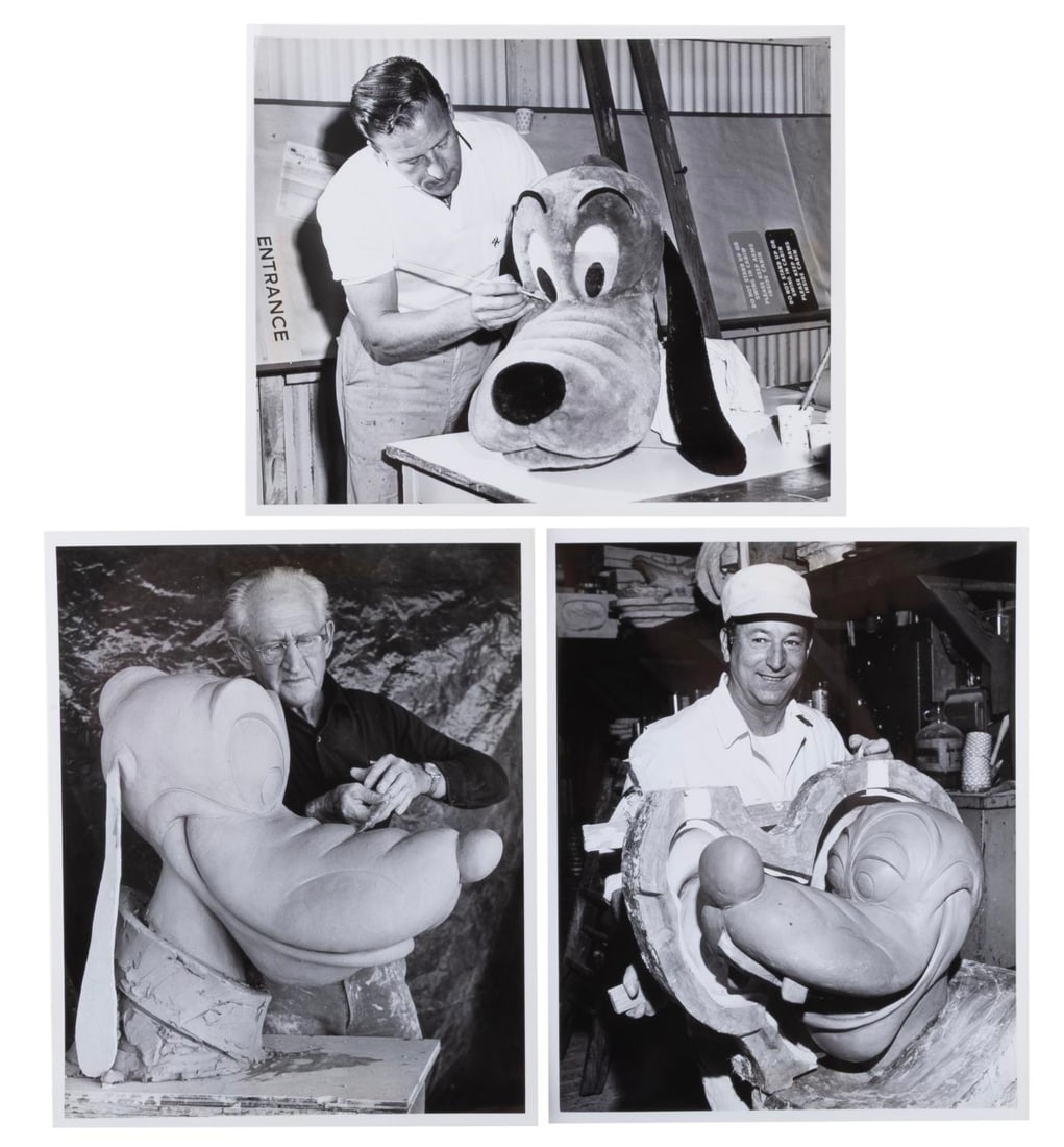Three Disneyland Pluto Costume Publicity Photos.: (Disneyland, 1950s-60s) Three publicity photos showing the production of a Pluto walk-around character's head for Disneyland. Measuring 8" x 10", the photos are in very good condition, with the origin