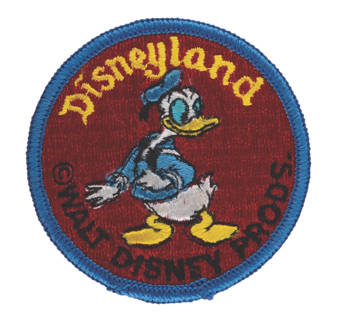 A Disneyland Donald Duck Patch.: (Disney, 1970s-80s) A souvenir embroidered Donald Duck patch from Disneyland. Measuring 3” in diameter the unused patch is in fine condition.