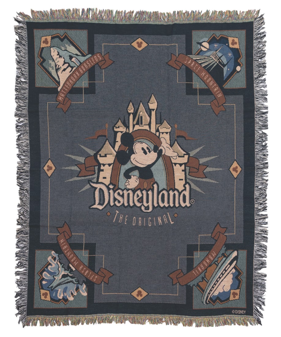 A Disneyland "The Original" Throw Blanket.: (Disneyland, 1990s) A large throw blanket featuring Mickey Mouse, Park iconography, and "The Original," a slogan used by Disney during the 1990s. Measuring 56.5" x 71.5", the throw blanket is in very