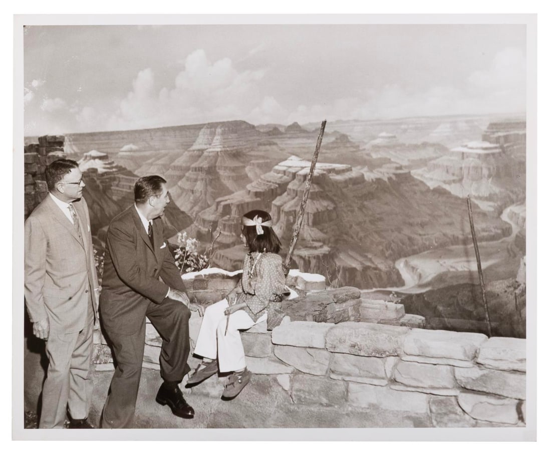 A Grand Canyon Diorama Dedication Photo.: (Disneyland, 1958) A publicity photo from the dedication of the Disneyland Railroad’s Grand Canyon Diorama with Walt Disney, Santa Fe Railroad CEO Fred Gurley, and a child representing the Hopi Indi