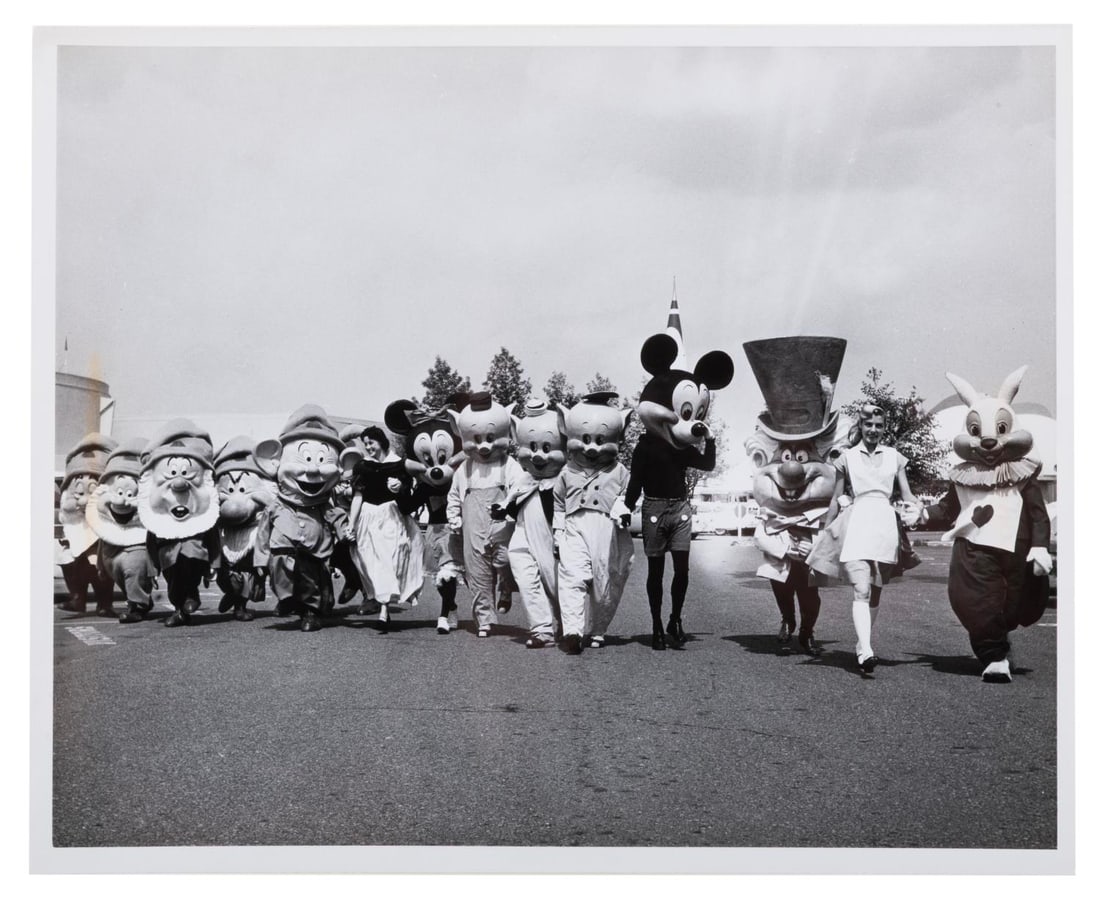 A Characters of Disneyland Publicity Photo.: (Disneyland, 1961) A publicity photo of walk-around characters promoting Disneyland’s Summer 1961 Season. Included are characters from “Snow White and the Seven Dwarfs,” “Alice in Wonderla