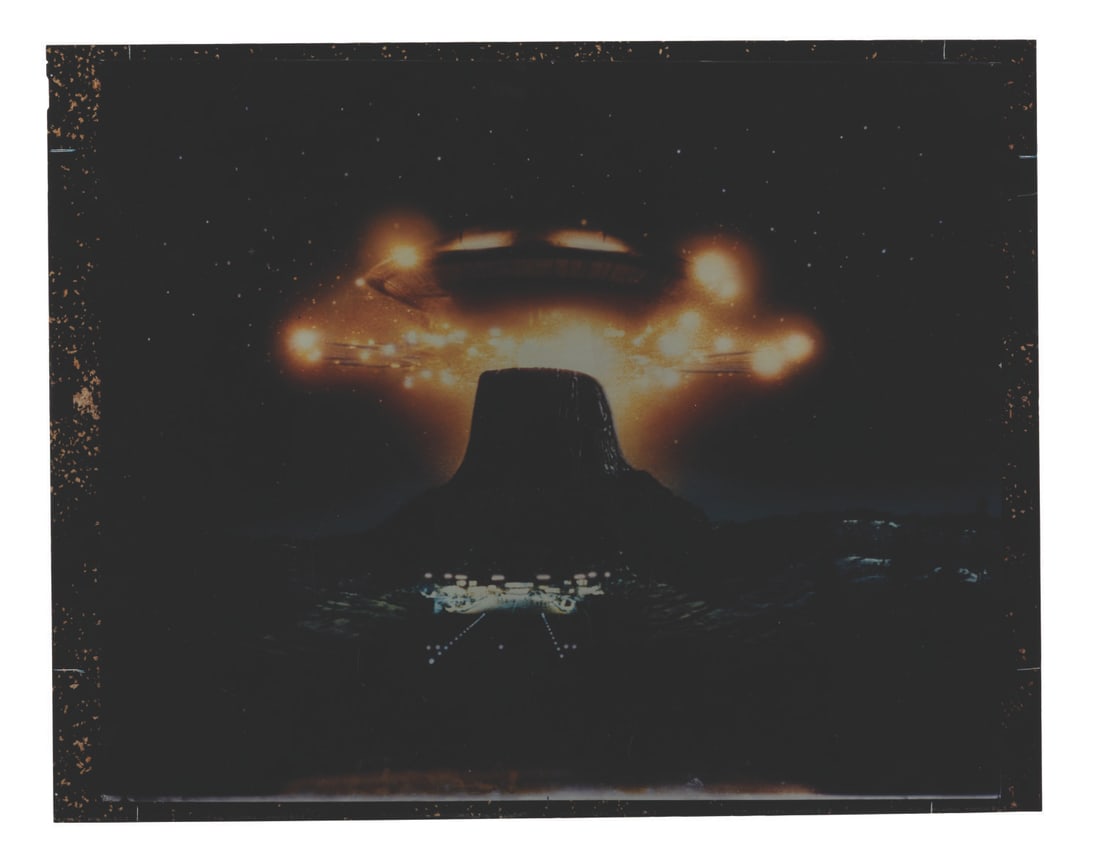 A "Close Encounters of the Third Kind" Transparency.: (Columbia, 1977) A large transparency of imagery from the poster for Steven Spielberg's sci-fi classic "Close Encounters of the Third Kind." Measuring 11" x 14", the transparency displays in very