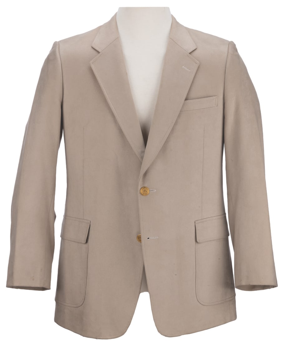 A Bob Hope Charity Golf Tournament Personal Sports Coat.: (Bob Hope, 1961) A suede sports coat, custom-made for Bob Hope and his Palm Springs charity golf tournament. The coat features "PS" monogrammed buttons and an embroidered "Bob Hope Charity Tournament"