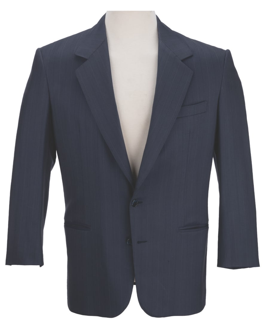 Tom Cruise's Suit Jacket from "The Firm.": (Paramount, 1993) A costume suit jacket worn by Tom Cruise in the legal thriller "The Firm," based on the novel by John Grisham. The jacket's inner pocket maintains its Western Costume Co. of