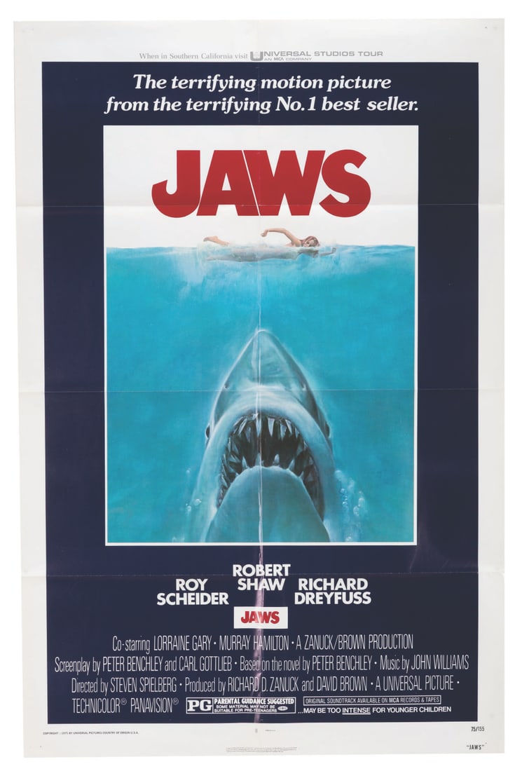 A "JAWS" One-Sheet.: (Universal, 1975) An original release one-sheet for Steven Spielberg's "JAWS." This variant features the invitation "When in Southern California visit Universal Studios Tour" along the top border and