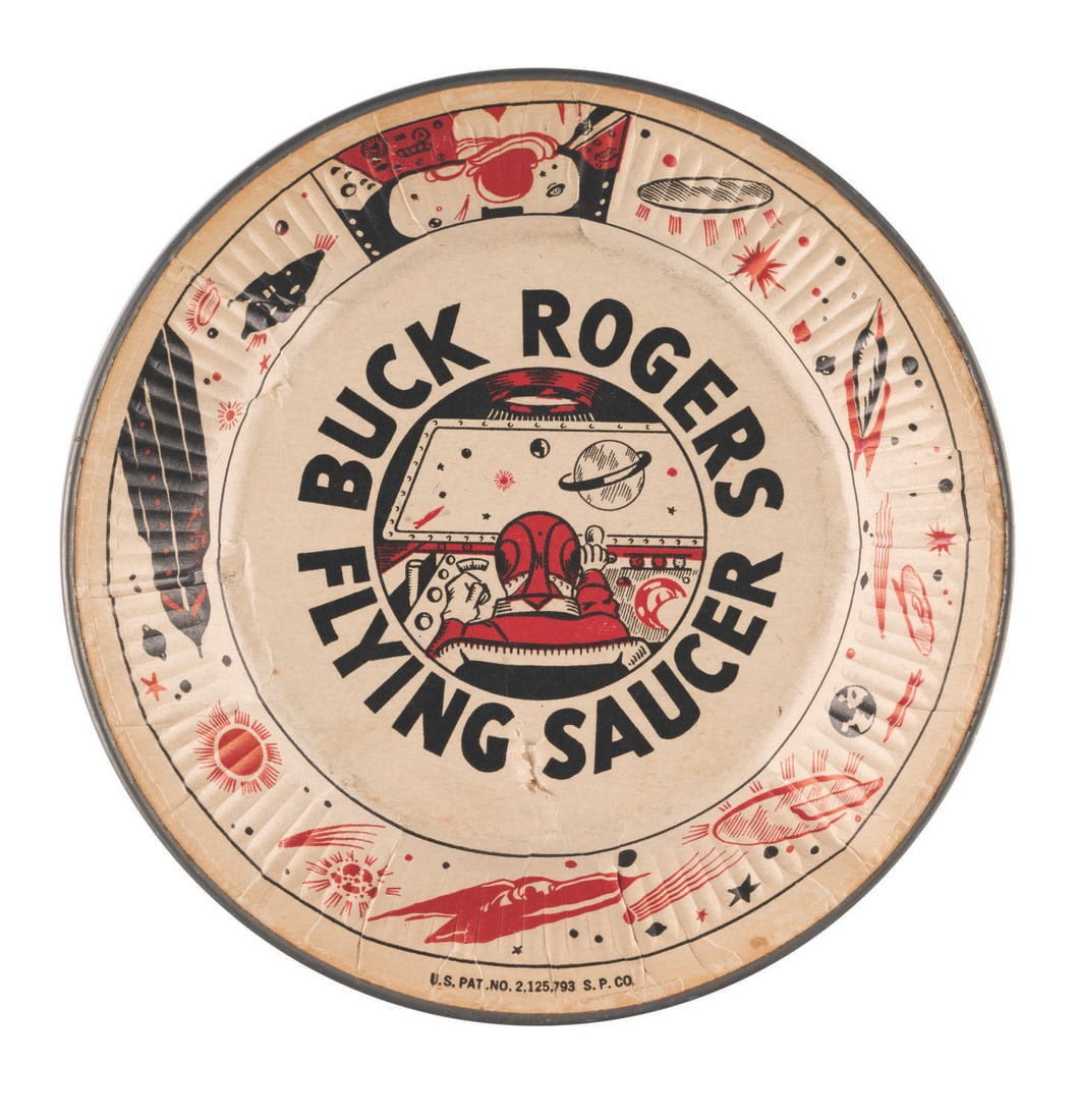 A Buck Rogers Flying Saucer Toy.: (S.P. Co., 1940s) A very rare Buck Rogers flying toy, inspired by the sci-fi comic book series created by Philip Francis Nowlan. This toy dates back to the late 1940s, when the term "flying saucer"