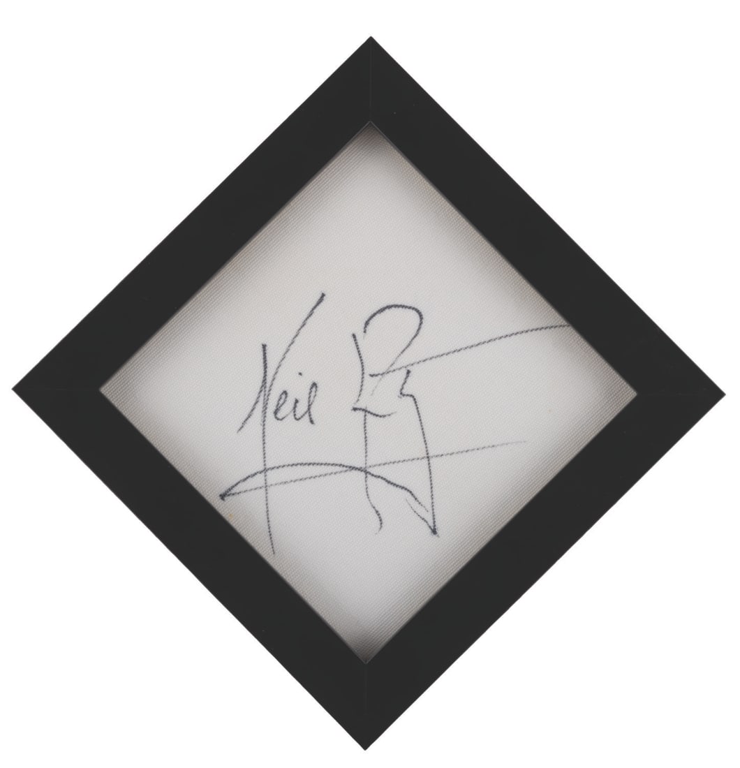 A Neil Armstrong Signed Fabric Square. (1 of 2)