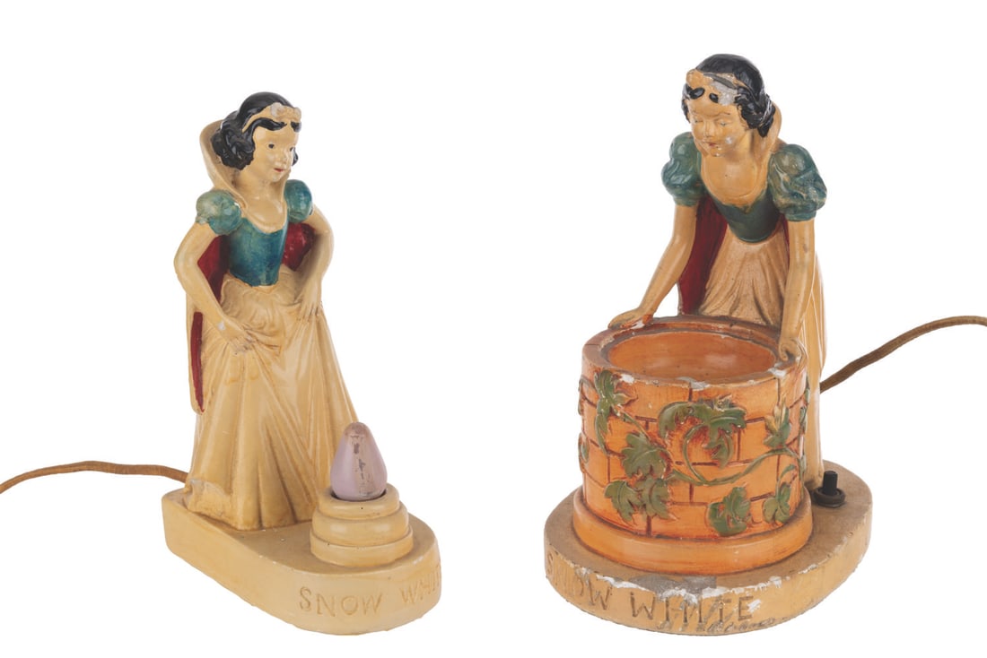 A Pair of La Mode "Snow White" Night Lights.: (La Mode Studios, 1938) A pair of "Snow White and the Seven Dwarfs" chalkware night lights by La Mode Studios of New York. The lights did not work when tested, likely requiring repair to function.