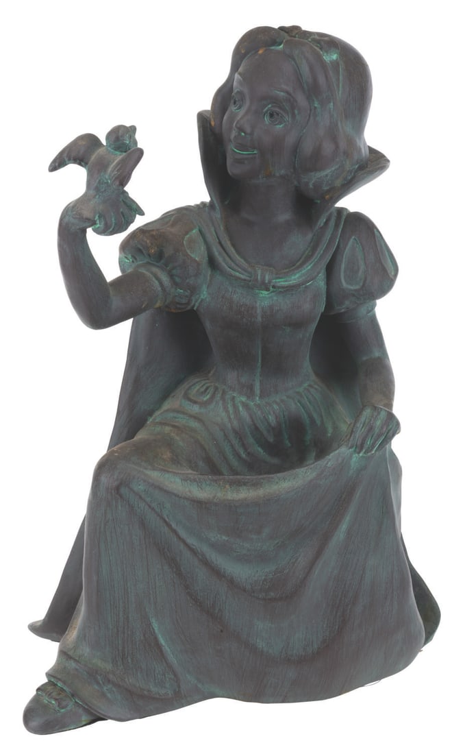 A Disney Catalog Snow White Bird Feeder.: (Disney, 1997) A figural Snow White bird feeder, sold exclusively through The Disney Catalog. Measuring 14" x 9" x 16.5" tall, the heavy resin statue is in good condition with wear, stains, and