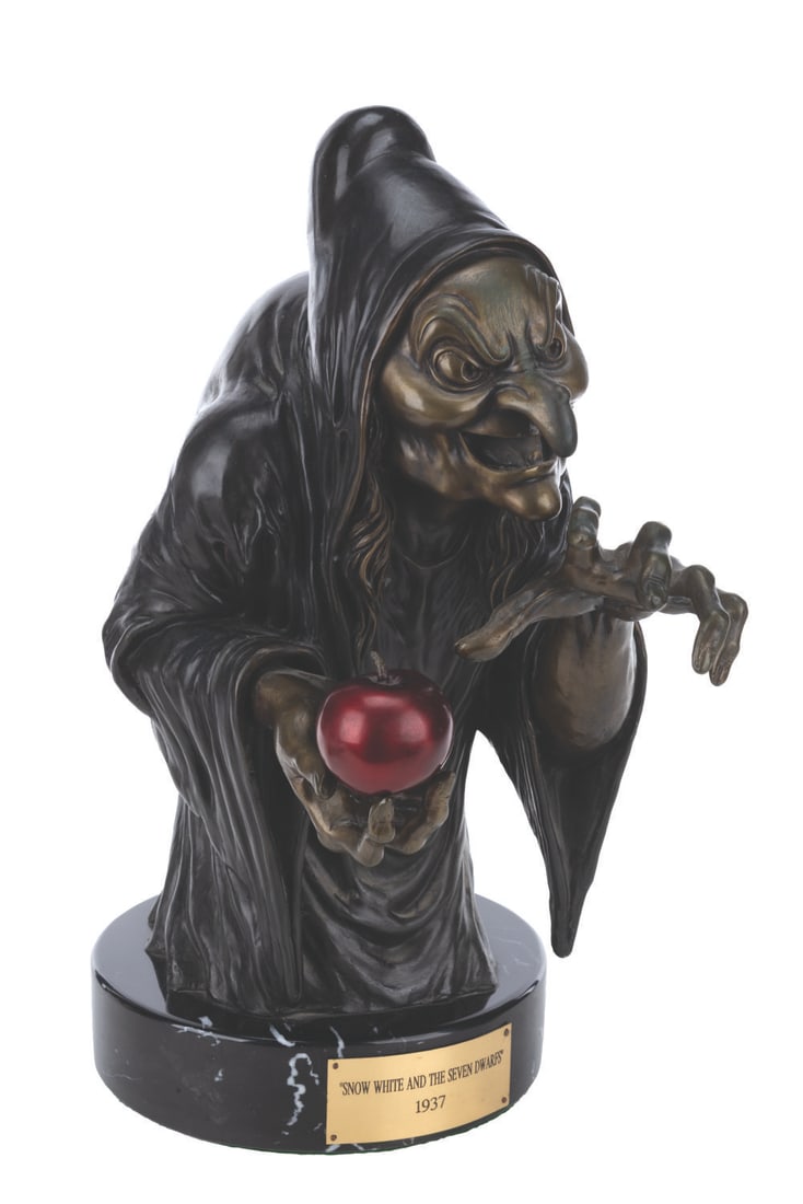 A "Snow White" Old Hag Limited Edition Bronze Sculpture.: (Disney, 1994) A limited edition bronze sculpture of the Old Hag from "Snow White and the Seven Dwarfs," by Dave Smith. The bronze sculpture featuring a removable red apple and a marble base is hand-c