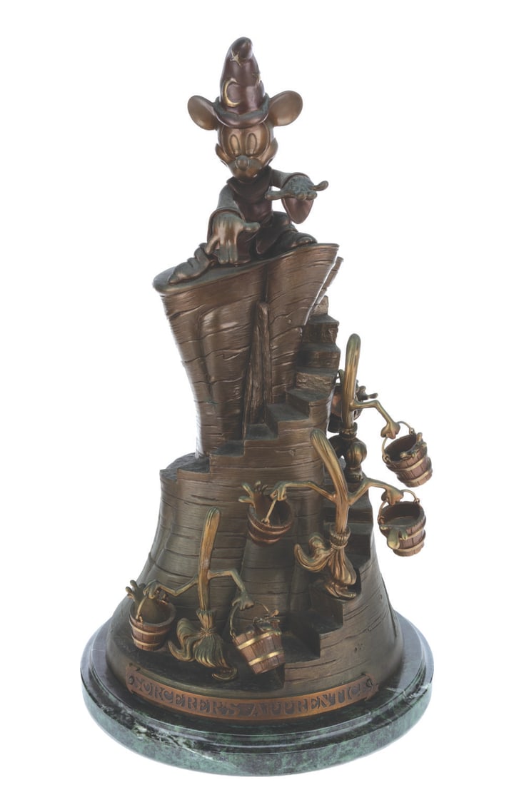 A Bronze "Fantasia" Sorcerer Mickey Sculpture.: (Disney, 1990s-2000s) A bronze sculpture of Mickey as the Sorcerer's Apprentice from Walt Disney's "Fantasia." This sculpture by renowned sculptor and Disney artist Bill Toma was released in a