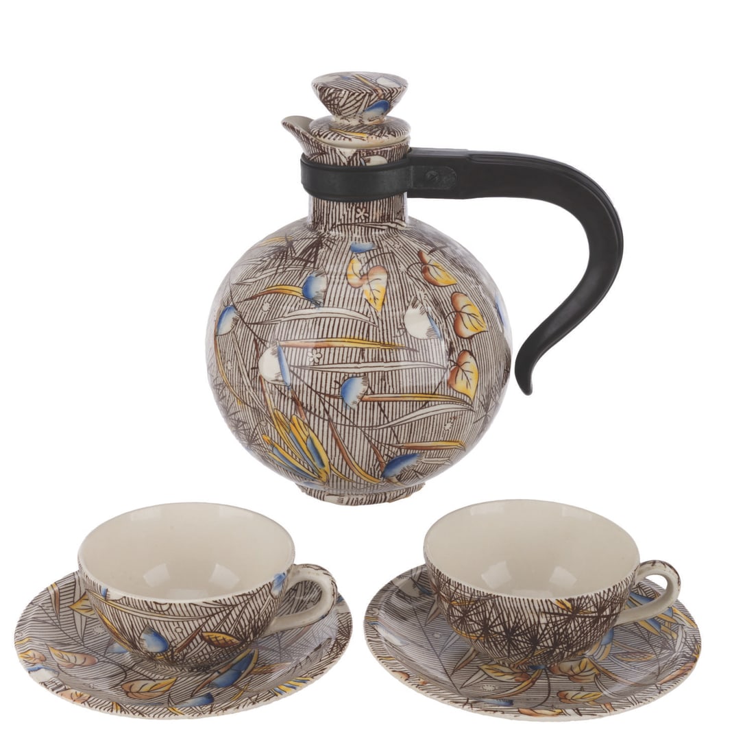 A "Fantasia" Coffee for Two Set.: (Vernon Kilns, 1940) A rare Vernon Kilns coffee service for two set, in the Autumn Ballet "Fantasia" pattern. Included are two cups, two saucers, and the scarcely-seen coffee pot with bakelite handle 