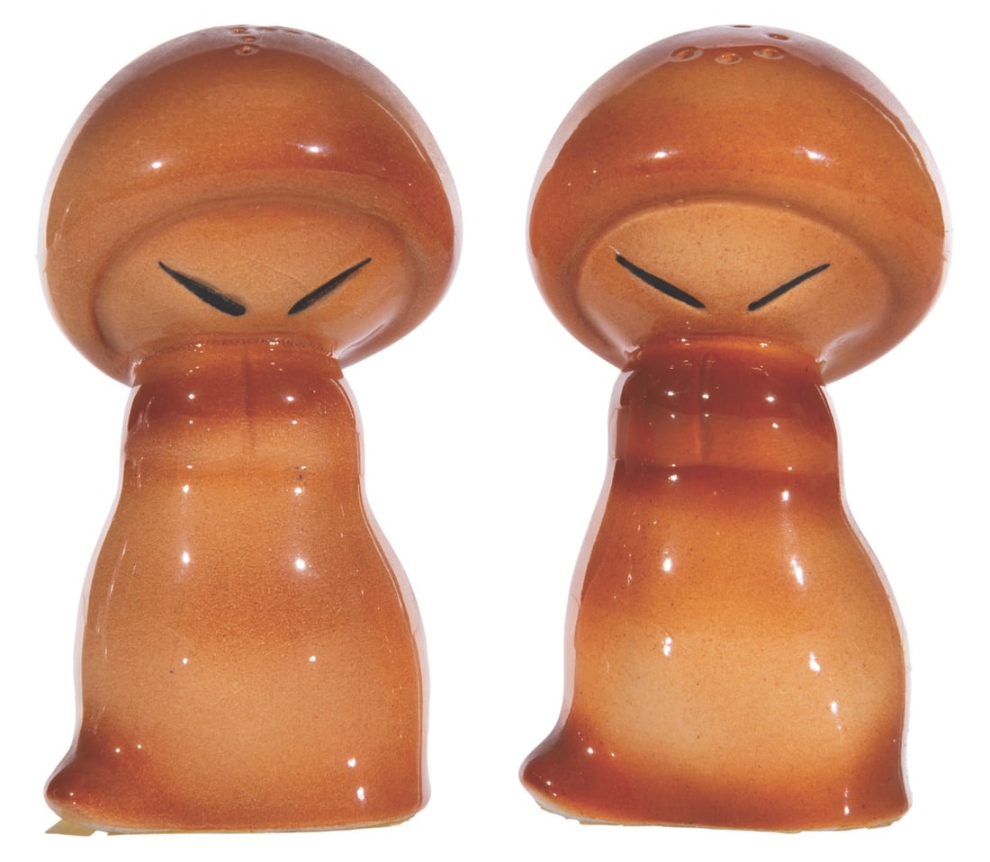 A "Fantasia" Mushroom Salt and Pepper Shaker Set.: (Vernon Kilns, 1941) A set of "Hop Lo" mushroom salt and pepper shakers based on the Nutcracker Suite sequence of "Fantasia." Each measures 3.25" tall and is in very good condition with light crazing,