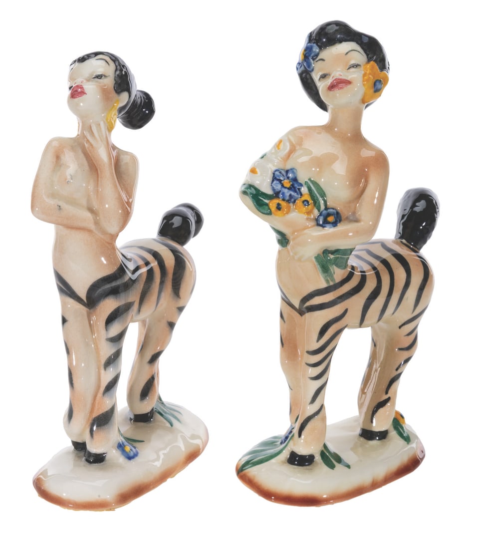 A Pair of Rare "Fantasia" Centaurette Figurines.: (Vernon Kilns, 1940) Both "Nubian" Centaurette figures from Vernon Kilns' "Fantasia" line, inspired by the Pastoral Symphony sequence of "Fantasia." Standing 7.5" x 8" tall, the figurines are in fine 