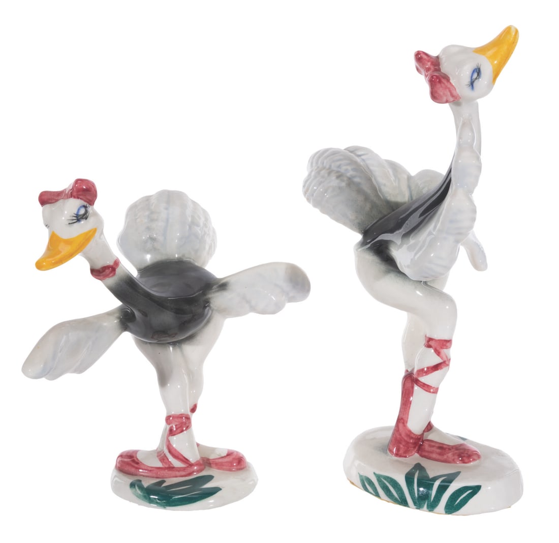 A Pair of Vernon Kilns "Fantasia" Ostrich Figurines.: (Vernon Kilns, 1940) A pair of painted glazed figurines of the ostrich ballet dancers from the Dance of the Hours sequence of "Fantasia." Measuring 4" x 6.5" x 6" and 4.5" x 5" x 9" tall, the ceramic 
