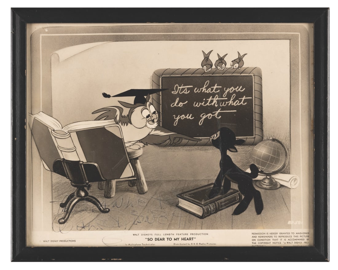A Walt Disney Signed "So Dear to My Heart" Publicity Photo.: (Disney, 1948) A framed "So Dear to My Heart" publicity photo, signed by Walt Disney himself. "So Dear to My Heart" was one of Walt's favorite and most personal films, as it reminded him of his
