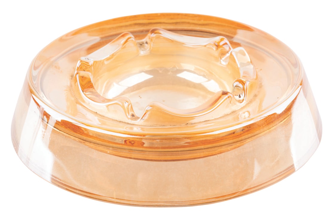 A Disney Studio Ashtray Used by Walt.: (Disney, 1950s-60s) A glass ashtray from the Disney Studio, very likely used by Walt himself. This style of ashtray was found mid-century around the Studio, especially in any meeting Walt attended.