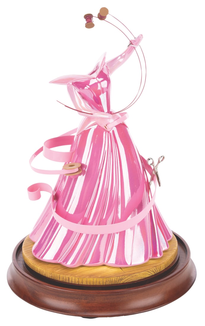 A WDCC "Sleeping Beauty" Aurora's Dress Figurine.: (WDCC, 1999) A Walt Disney Classics Collection figurine of Aurora's dress from "Sleeping Beauty." Titled "A Dress a Princess Can Be Proud Of," the figurine was designed by Valerie Edwards and