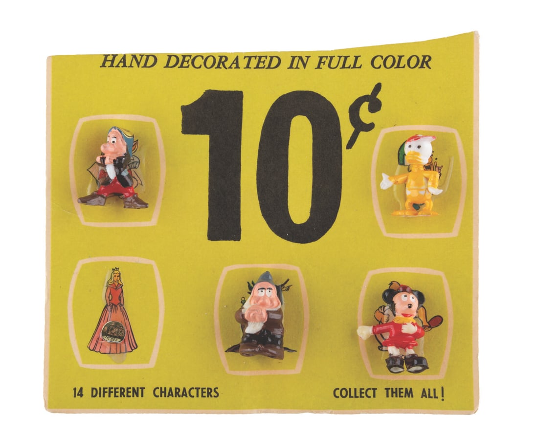 A Set of Disneykins on Rare Display Card.: (Marx, 1960s/70s) Four series one Disneykins displayed for sale on a paper backing. This type of card was displayed within capsule machines around the early 1970s. Promoted as "Hand Decorated in Full
