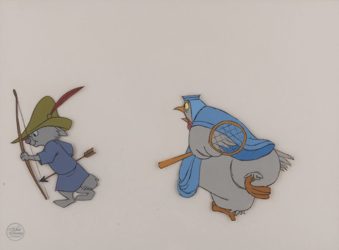 A "Robin Hood" Original Production Cel.: (Disney, 1973) A framed original production cel of Skippy and Lady Cluck from Walt Disney's "Robin Hood." Skippy and Lady Cluck have image sizes of 3.5" x 4.5" and 4.5" x 5" on a 9.5" x 13" visible ce