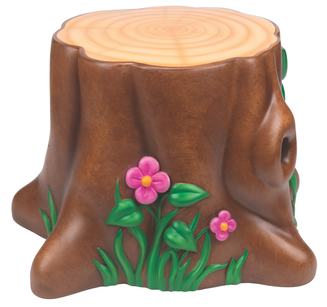 A Winnie the Pooh Disney Store Tree Stump Prop.: (Disney Store, 2005-2007) A tree stump prop originally featured in a Winnie the Pooh display at the Disney Store. Measuring 24" x 25" x 16" tall, the stump is in fine condition. This item requires