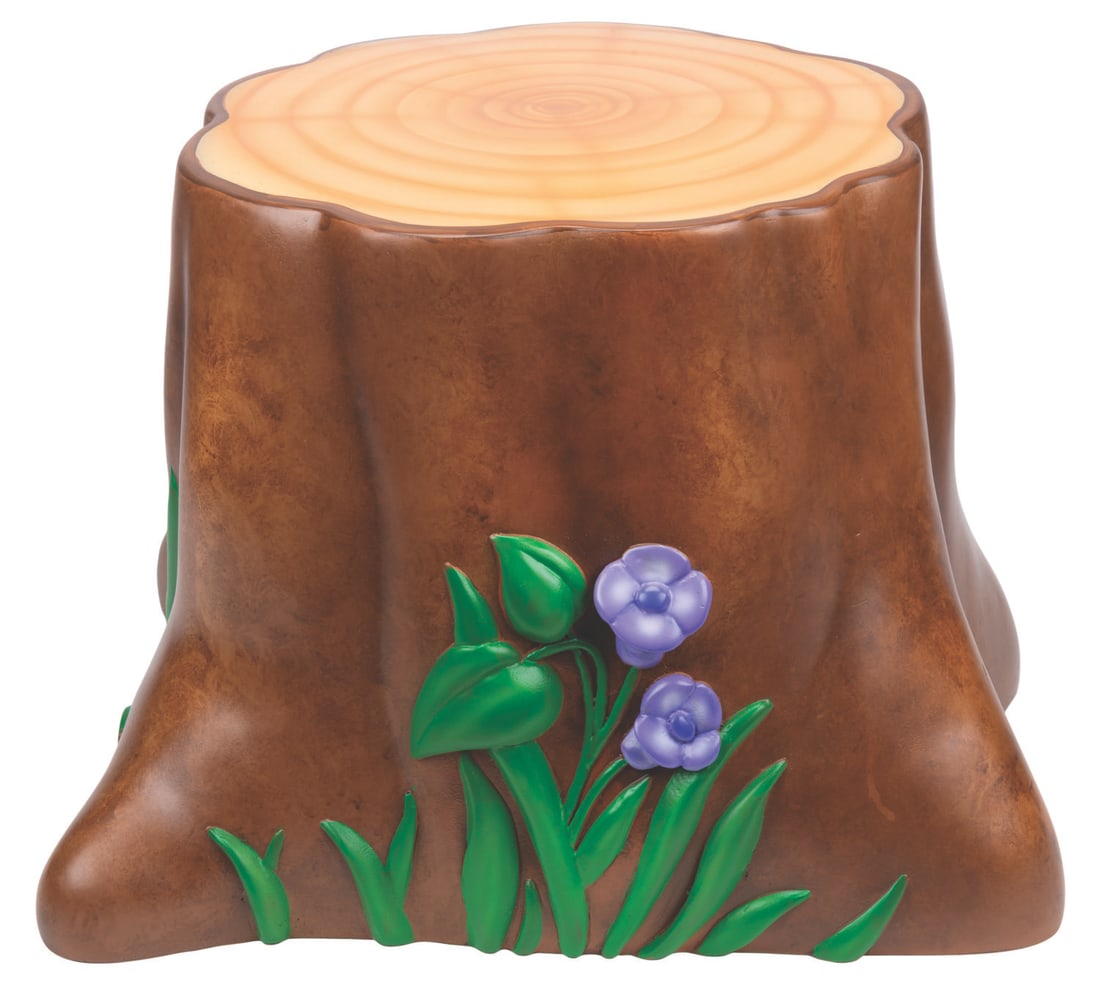 A Winnie the Pooh Disney Store Tree Stump Prop.: (Disney Store, 2005-2007) A tree stump prop originally featured in a Winnie the Pooh display at the Disney Store. Measuring 24" x 24" x 14.5" tall, the stump is in fine condition. This item requires