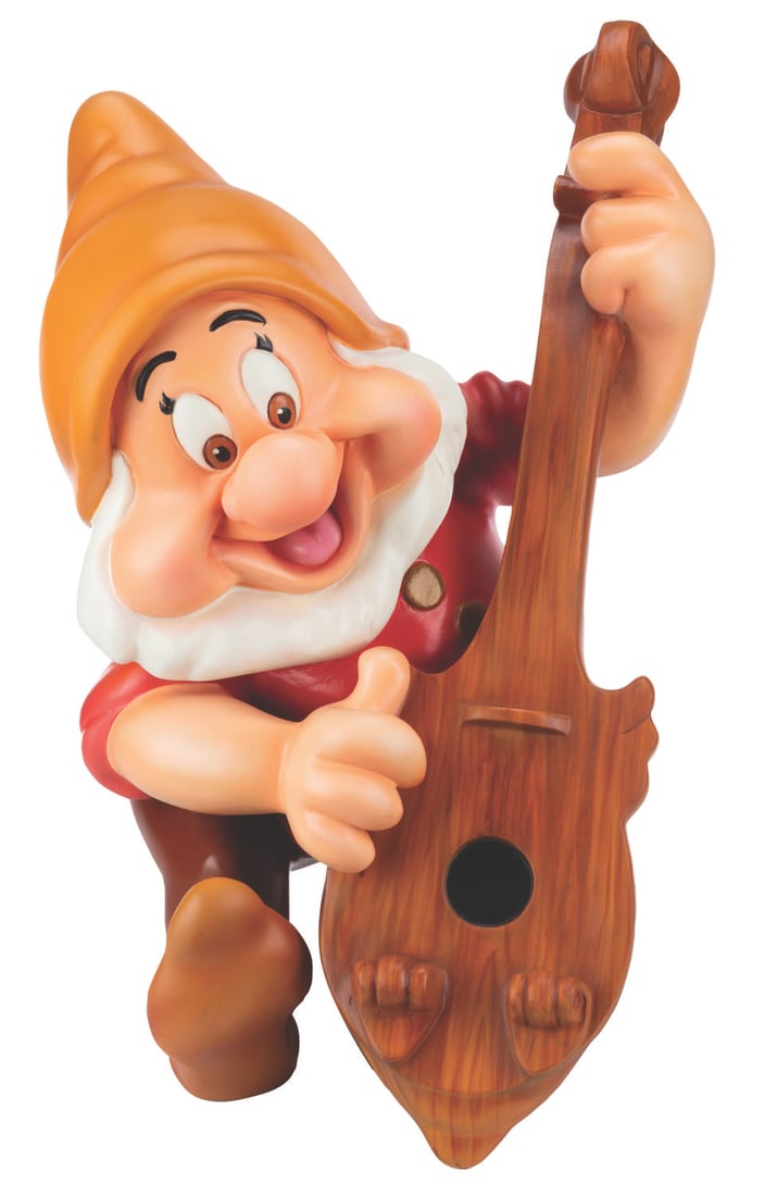 A Doc Disney Store Display Figure.: (Disney Store, 1995) A Disney Store display figure of Doc from "Snow White and the Seven Dwarfs" playing his upright bass. Measuring 19" x 18" x 26.5" tall, the fiberglass display is in very good